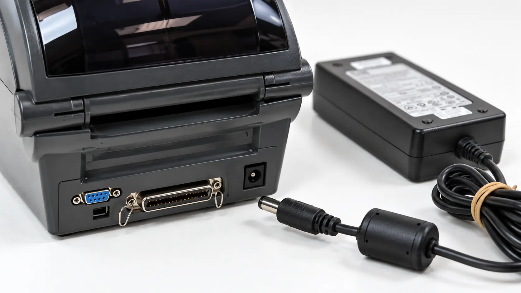 Zebra printer external power supply unit and DC connector prepared for recall identification